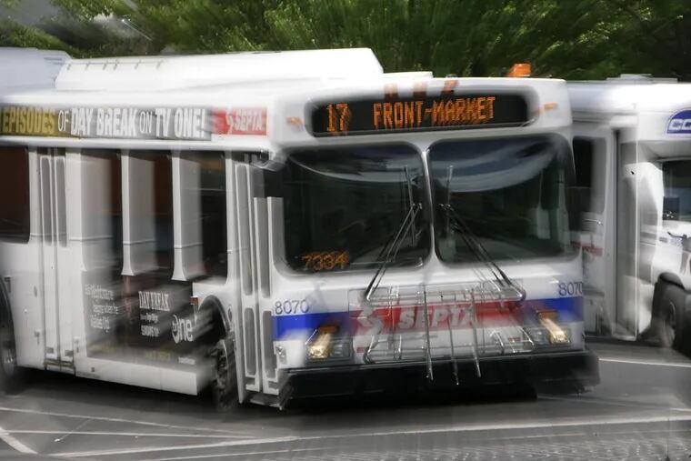 A SEPTA bus in Philadelphia. The driver of another bus is already using Sixers NBA championship messaging.