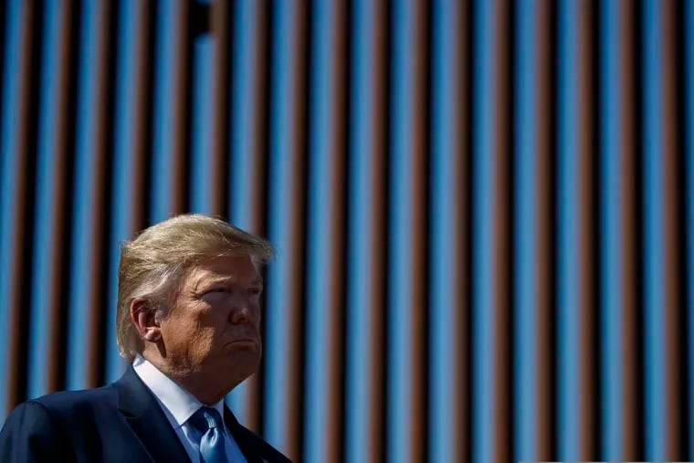 President Donald Trump tours a section of the southern border wall, Wednesday, Sept. 18, 2019, in Otay Mesa, Calif.