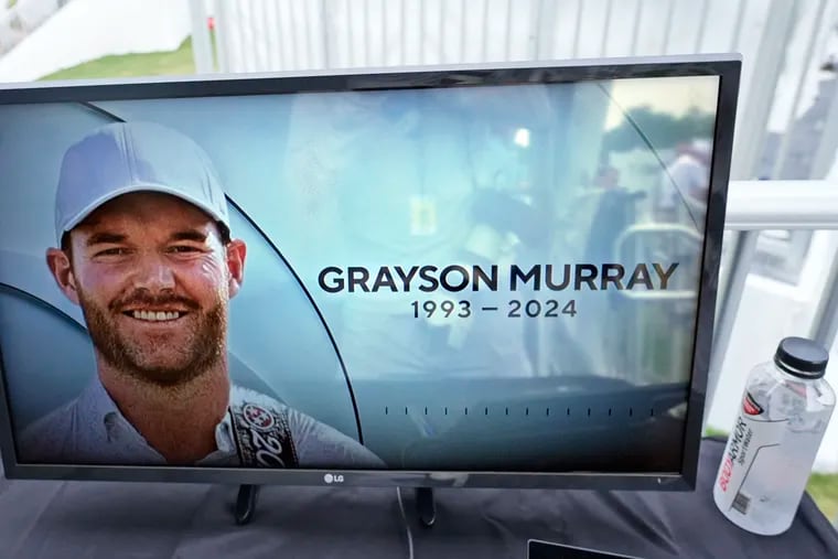 A golf television broadcast is played at the broadcast tent showing a photo of Grayson Murray during the third round of the Charles Schwab Challenge golf tournament at Colonial Country Club in Fort Worth, Texas, on Saturday.