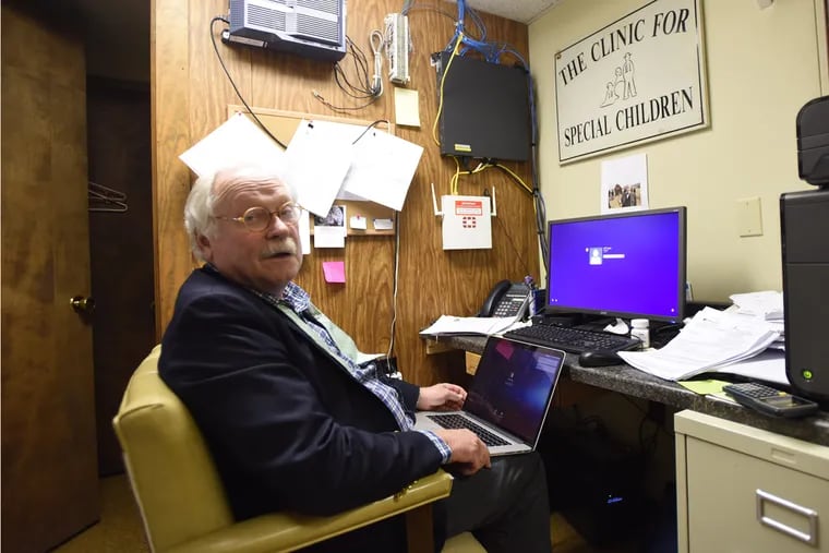 D. HOLMES MORTON, a renowned physician and geneticist on rare genetic diseases in the amish and mennonite community, is shown in his small office at the Belleville facility Thursday, June 30, 2016 in Belleville, Pa.