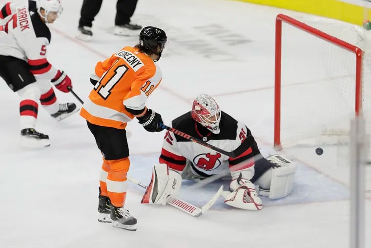 Right winger Travis Konecny watching the puck get past Devils goalie Cory Schneider in the Flyers' 4-0 win on Oct. 9. Konecny was the Flyers' best player in October.