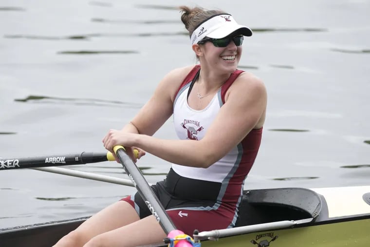 Conestoga's Laura Alcorn reacts to applause from spectators after she and her teammates won the Girls Senior Quad event at the Stotesbury Cup Regatta Saturday on the Schuylkill.