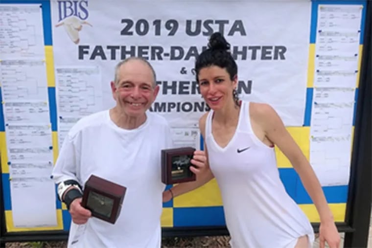 Richard Cohen and his daughter Julia celebrate their win at a tennis tournament in Florida last month.