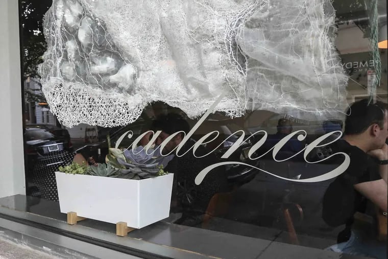 The celebrated BYOB Cadence in South Kensington recently announced its closure due to factors stemming from the pandemic. Its front window is pictured in 2018. It earned three bells from The Inquirer and was named one of America's best new restaurants in 2019 by Food & Wine.