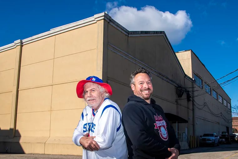 Alan Horwitz, left, and Kenny Holdsman, head of Philadelphia Youth Basketball, in front of a future hoops facility on Wissahickon Avenue.