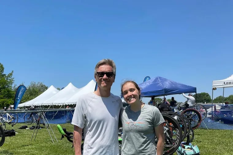 Penn Medicine researcher Kevin Volpp competed in a triathlon in June with daughter Anna, right. Doctors said his physical fitness helped him survive a heart attack and sudden cardiac arrest the following month.