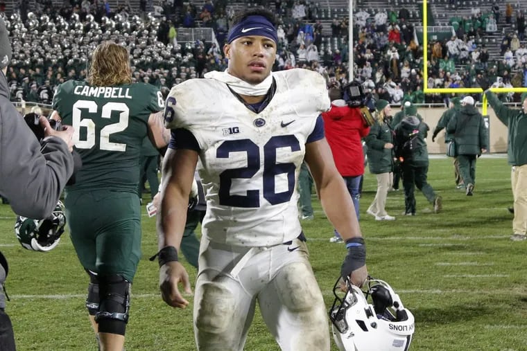 Penn State’s Saquon Barkley walks off the field following the team’s loss to Michigan State on Saturday.