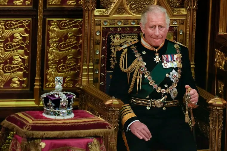 Prince Charles is seated next to the Queen's crown during the State Opening of Parliament, at the Palace of Westminster in London in May.