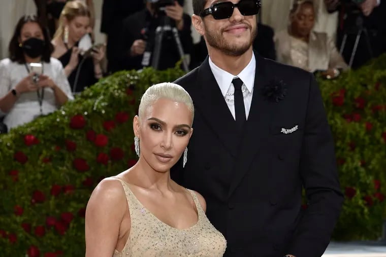 Kim Kardashian, left, and Pete Davidson attend The Metropolitan Museum of Art's Costume Institute benefit gala May 2. Her hourglass silhouette -- and how she got it -- lit up social media.