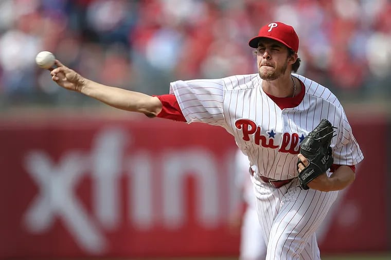 Phillies' pitcher Aaron Nola throws against the Padres during the first inning at Citizens Bank Park during Opening Day in Philadelphia.