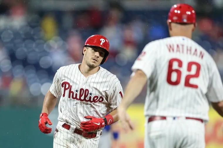 Phillies catcher J.T. Realmuto rounds third on his solo home run against the Cubs Tuesday night.