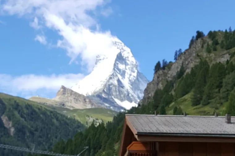 The author’s family walks through Zermatt village, the Matterhorn in the background.