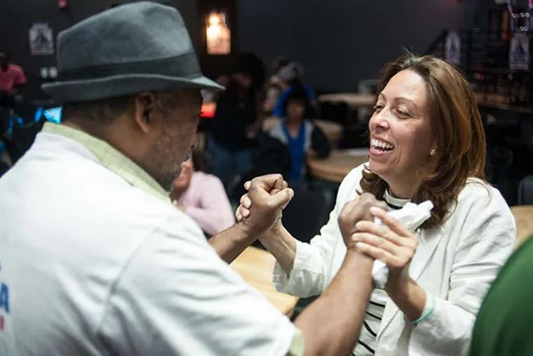 Leslie Acosta celebrating her lead in a race that included State Rep. J.P. Miranda, who is under indictment. &quot;He paid for this at the polls,&quot; Acosta said. &quot;People really kind of spanked him and reprimanded him.&quot; MATTHEW HALL / Staff Photographer