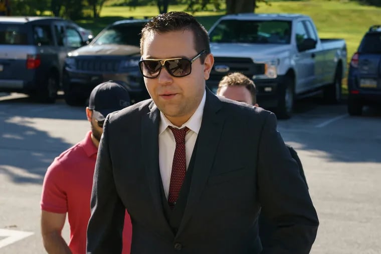 Nikolaos Tzima Hatziefstathiou, a.k.a. "Nik the Hat," arrives Thursday for a preliminary hearing on charges that he manufactured a fake, race-fueled scandal in Delaware County using altered emails from the county's probation department.