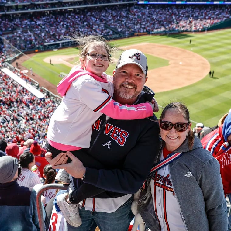 Jeff and Alison Donovan of Orlando with their daughter, Emily, are big Braves fans who never like to miss opening day. They spent their first visit to Philly at Citizens Bank Park on March 29, 2024.