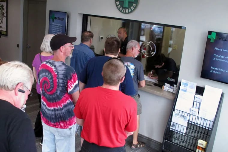 In 2015, people line up to be among the first in Nevada to legally purchase medical marijuana at the Silver State Relief dispensary in Sparks, Nev.