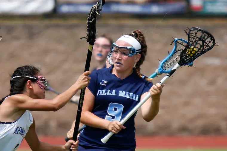 Villa Maria attack Hannah Young faces tight defense from Kennard-Dale defender Jenna Soukaseum during the second half of the PIAA Class 2A girls' lacrosse championship game Saturday, June 9, 2018, at West Chester East. Villa went on to win, 17-5.