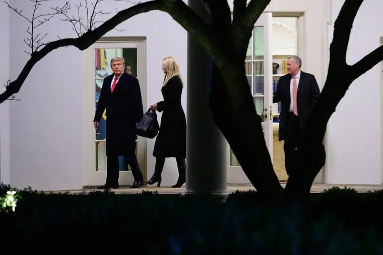 (From left) Then-President Donald Trump, daughter and senior adviser Ivanka Trump, and Mark Meadows, then-White House chief of staff, depart the White House before boarding Marine One in Washington on Jan. 4, 2021.