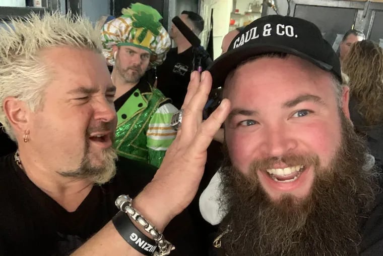 Guy Fieri (left) clowns with Gaul & Co. Malt House co-owner Matthew Yeck for an episode of "Diners, Drive-Ins and Dives" that was taped in early 2020 in Philadelphia.