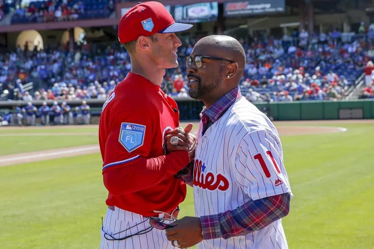 Former Phillies shortstop Jimmy Rollins with Phillies manager Gabe Kapler during Phillies alumni events before the Phillies played a spring training game against the Toronto Blue Jays at Spectrum Field in Clearwater, FL on Sunday, March 4, 2018.