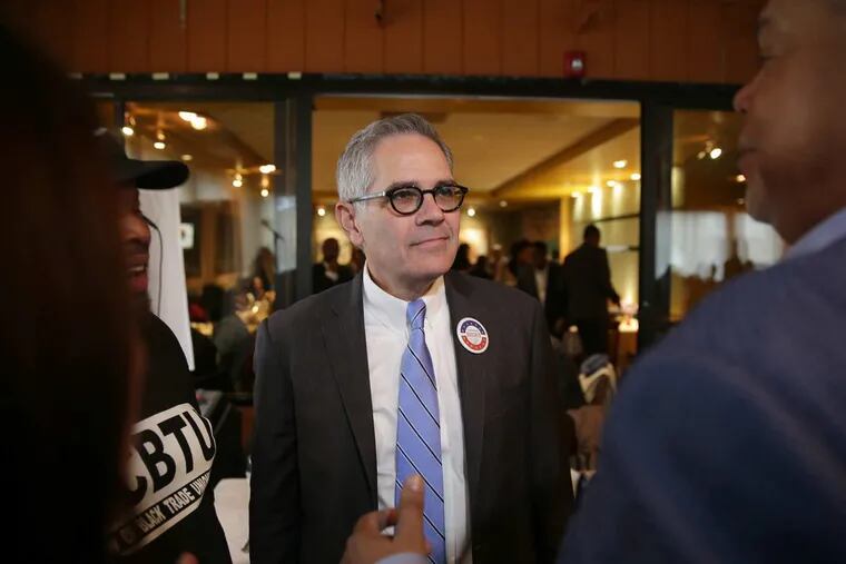 DA candidate Larry Krasner, center, talks with Sen. Anthony H. Williams, right, at Relish restaurant on election day in Philadelphia, PA on November 7, 2017.