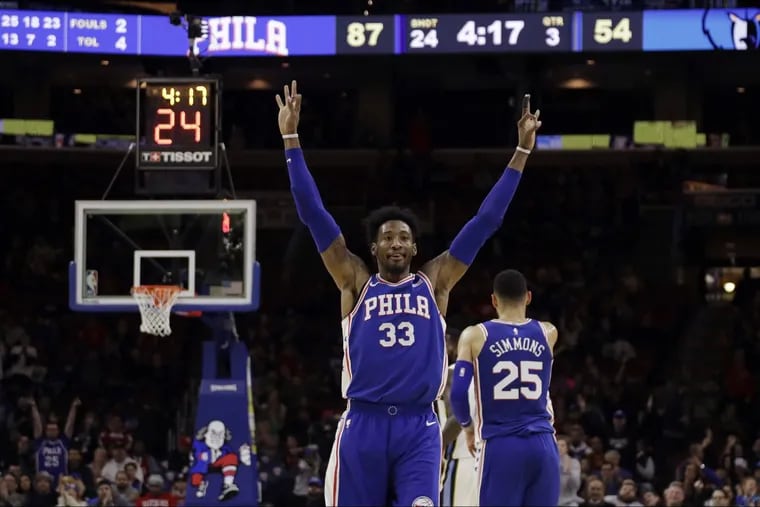 Robert Covington celebrates after making a three-pointer during the second half of the Sixers’ 119-105 win over Memphis Wednesday night.