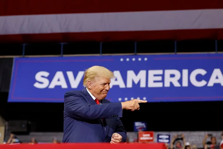 Former President Donald Trump points to supporters during the Save America rally at the Mohegan Sun Arena at Casey Plaza in Wilkes-Barre, in September 2022.