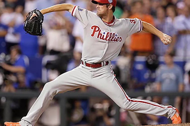 Cole Hamels pitched a scoreless seventh inning for the National League All-Stars. (Charlie Riedel/AP)
