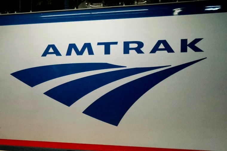 An Amtrak logo, seen on a train at 30th Street Station in Philadelphia. The union representing railroad workers is calling upon Amtrak to implement coronavirus testing, similar to programs implemented by NJ Transit and SEPTA.