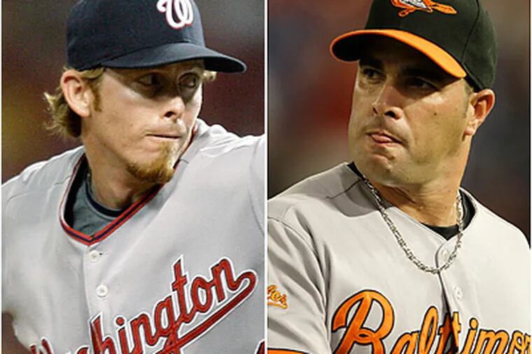 Mike MacDougal (left) saved 20 games for the Nationals in 2009. Danys Baez was 4-6 for the Orioles with a 4.02 ERA. (AP file photos)
