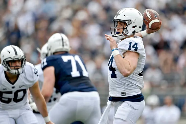 Penn State quarterback Sean Clifford (14) throws a pass during the Blue-White spring scrimmage back on April 13 in University Park, Pa.