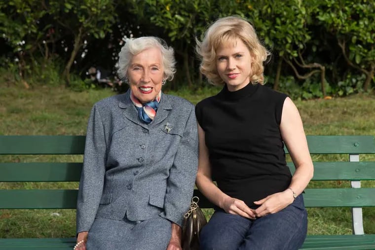 Artist Margaret Keane and actress Amy Adams on the set of &quot;Big Eyes.&quot; The signature said &quot;Keane,&quot; but the public was misled.