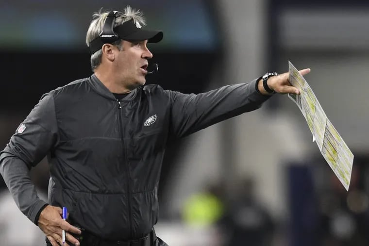 Eagles head coach Doug Pederson yelling instruction to his team from the sidelines during the Eagles 37-9 victory in Dallas on Sunday.