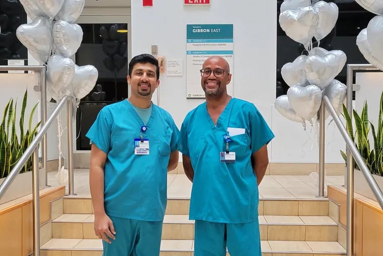 Jerin Juby, left, manager of respiratory care at Thomas Jefferson University Hospitals, Inc., and senior respiratory therapist, Jerome Taylor, right.