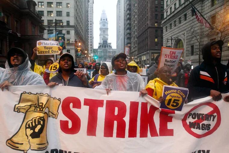 Minimum wage marchers on Broad Street after a rally outside City Hall in November 2015.
