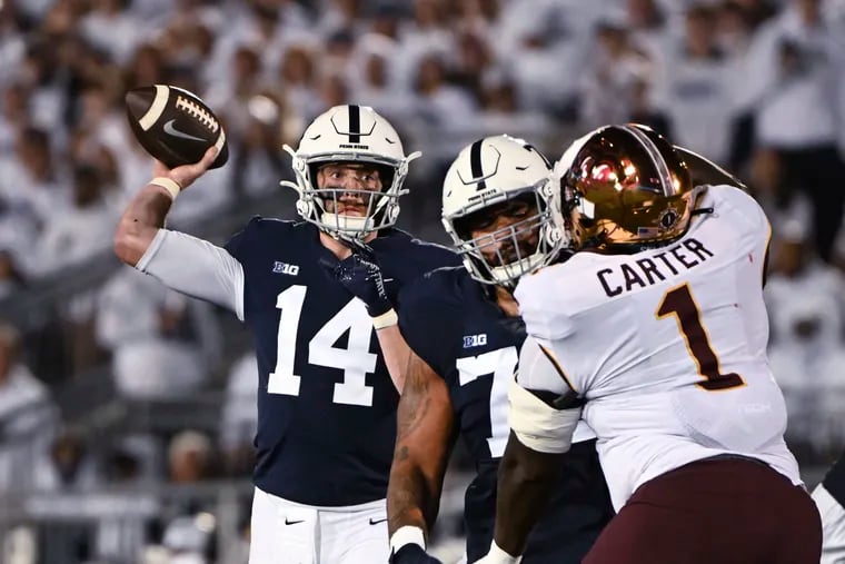 Penn State quarterback Sean Clifford (14) throws a pass during Penn State's 45-17 win over Minnesota on Saturday.