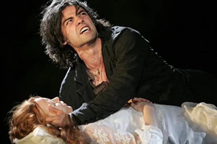 Oscar Isaac and Lauren Ambrose as &quot;Romeo and Juliet&quot; in New York&#0039;s Public Theater production, directed by Michael Greif and supported by a bang-up cast including Camryn Manheim.