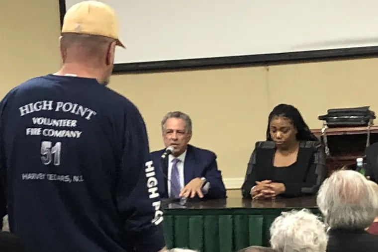 Philadelphia's Chief Assessment Officer Michael Piper speaks to residents at a meeting last year about the residential reassessment. Piper is now under fire as City Council President Darrell L. Clarke calls for new management at the city's assessment office.
