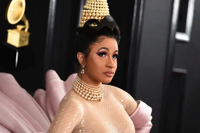 FILE - This Feb. 10, 2019 file photo shows Cardi B at the 61st annual Grammy Awards in Los Angeles. According to WNBC she was in a New York court room on Friday, April 19, 2019 where she rejected a plea deal in a case stemming from a New York strip club melee in the fall of 2018. (Photo by Jordan Strauss/Invision/AP, File)