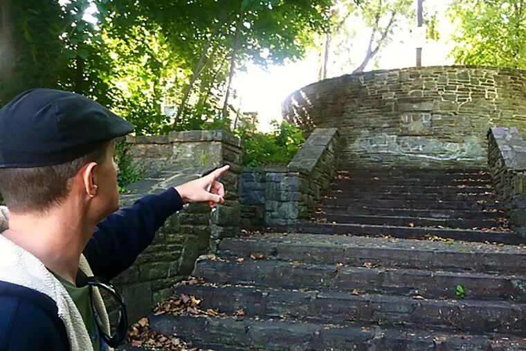 Kevin Cook, a historic preservation advocate from Cherry Hill, points out what he calls the "Grand Staircase" in the Collingswood portion of Cooper River Park. (Kevin Riordan/Staff)