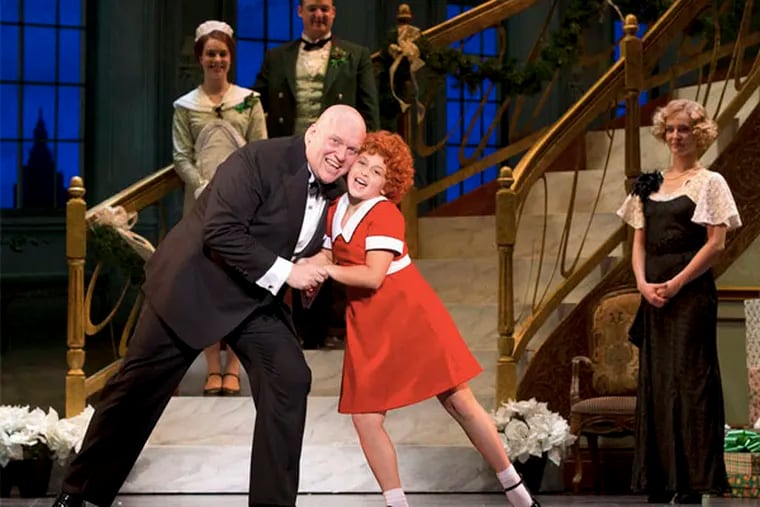 “Annie” stars Issie Swickle in the title role and Gilgamesh Taggett as Daddy Warbucks. (JOAN MARCUS)