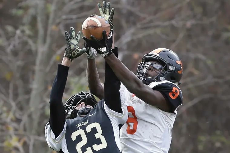 Woodrow Wilson's Stanley King (right), here in the South Jersey Group 3 title game at Burlington Township, led the Tigers with 79 catches for 1,413 yards and 15 touchdowns.