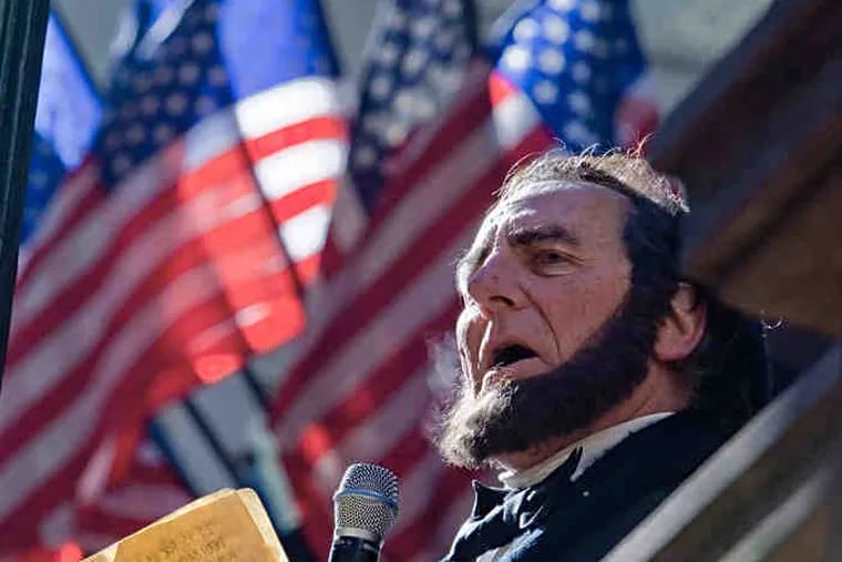 Christian Johnson of Cherry Hill as President Abraham Lincoln delivers the Gettysburg Address at the Union League in Philadelphia, where N.J. Gov. Christie received an award. Story, B6.