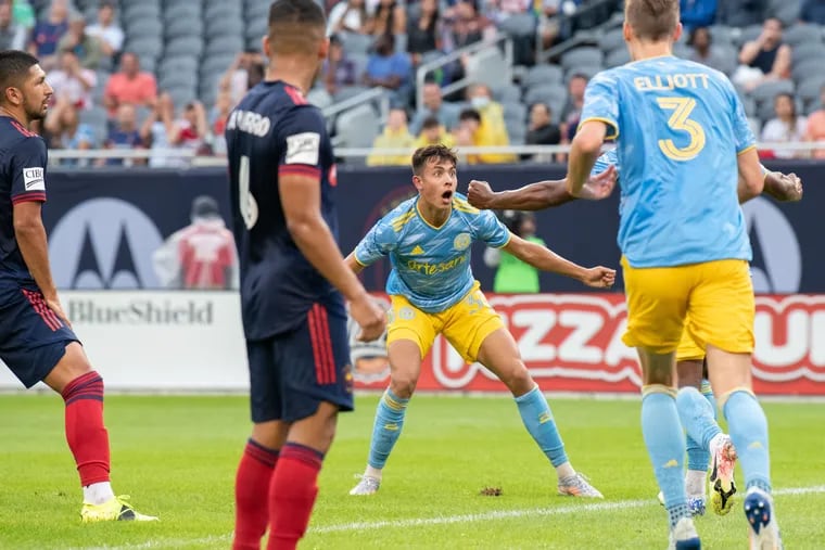 Quinn Sullivan (center) reacted with disbelief after scoring a goal on a bicycle kick during the Union's game at the Chicago Fire last Saturday.