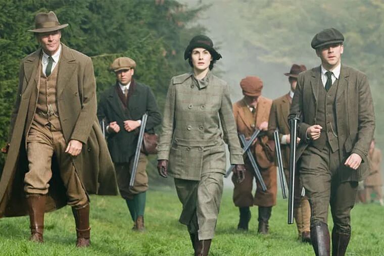 The hunting party in &quot;Downton Abbey&quot; - (from left) Iain Glen as Sir Richard Carlisle, Michelle Dockery as Lady Mary, and Dan Stevens as Matthew Crawley &#0150; wearing the tweed outfits on display at Winterthur.