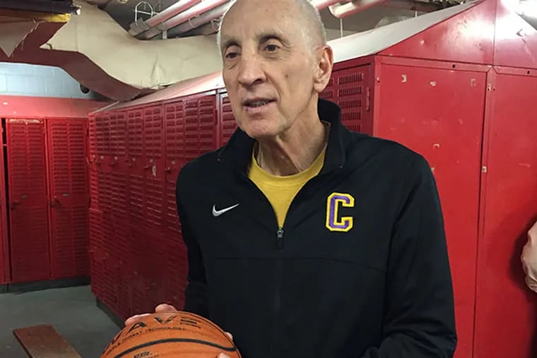 Camden coach John Valore in the locker room at Perth Amboy
after earning his 600th win with a victory over Manasquan in the State
Group 2 semifinals on March 11. (Staff Photo)