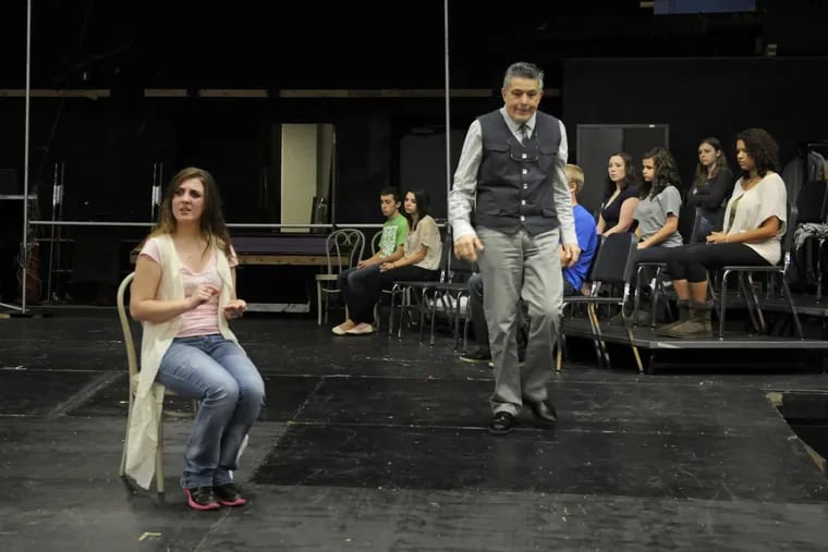 Truman High drama teacher Lou Volpe (right) rehearses “Spring Awakening” with his student actors in 2011. Michael Sokolove’s book “Drama High” was about that season, and has been adapted for the fictional TV series “Rise.”
