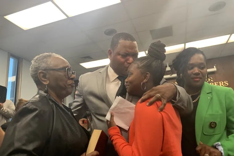 An emotional Marty Small Sr. is sworn in as Mayor of Atlantic City. Verona Tally, the mother of a friend of Small's who was shot to death earlier this year, holds the bible. Also with Small is his daughter, Jada, and his wife, Dr. La'Quetta Small, the principal of Atlantic City High School.