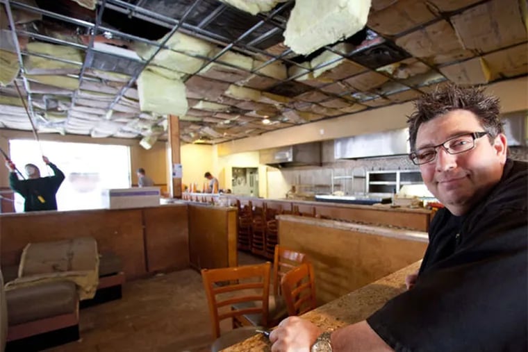 Angelo Lutz at the future home of his restaurant, the Kitchen Consigliere Cafe, in Collingswood. (David M Warren / Staff Photographer)