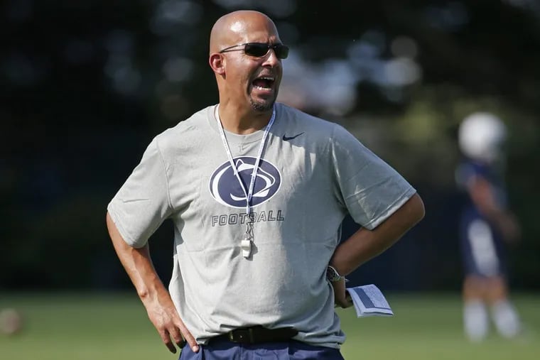 Penn State head coach James Franklin gives instruction during the a 2014 Nittany Lions practice.